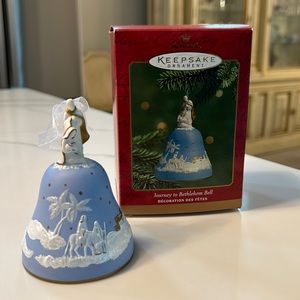 Hallmark collectible bell ornament. The journey of Mary and Joseph to Bethlehem.